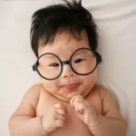 baby using white eyeglasses